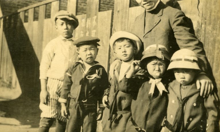 Fr. Wu and church children in front of Clay Street church c1920s